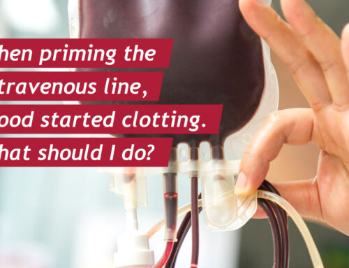 When priming the intravenous line, blood started clotting. What should I do?